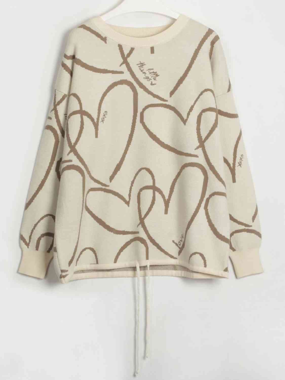 Heart Pattern Drawstring Hem Sweater