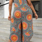 Plus Size Printed Spaghetti Strap Wide Leg Jumpsuit