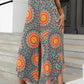 Plus Size Printed Spaghetti Strap Wide Leg Jumpsuit