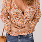 Floral Buttoned Plunge Peplum Blouse