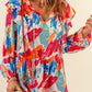 Brush Stroke Ruffled Tie Neck Blouse