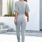 Buttoned Half Sleeve Round Neck Jumpsuit
