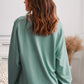 Button Detail Curved Hem Top
