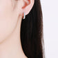 Always Chic Sterling Silver Moissanite Huggie Earrings